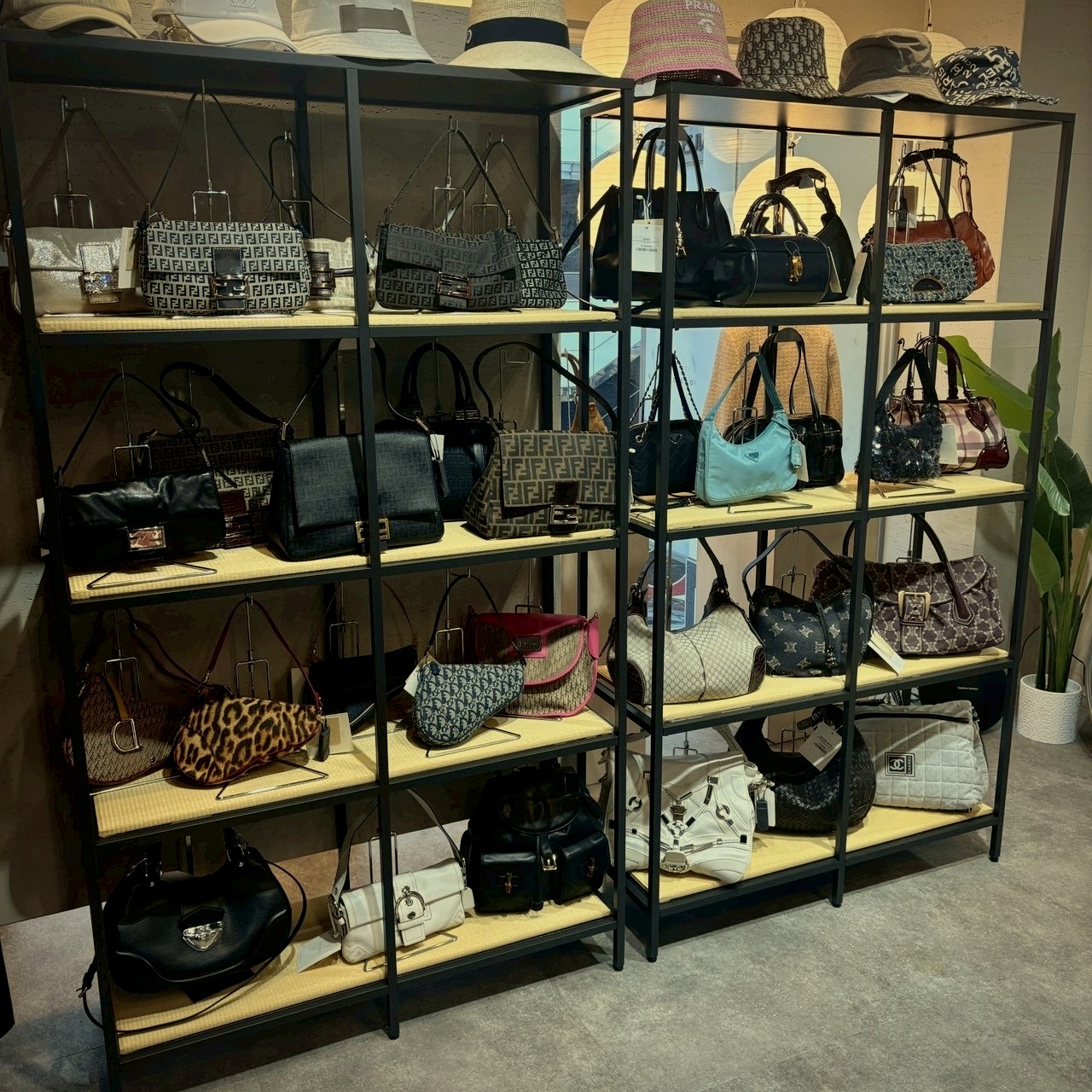 AMICO VINTAGE — curated vintage designer bags display featuring Fendi, Dior, Chanel
